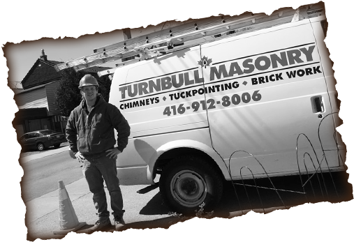 Turnbull Masonry truck with Clint Turnbull standing in front of it.