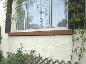 Brick wall of home after repairs have been made.