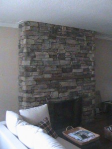Stone fire place in living room.