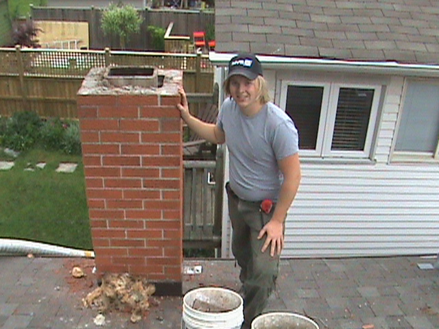 Clint Turnbull repairing chimney in Toronto.