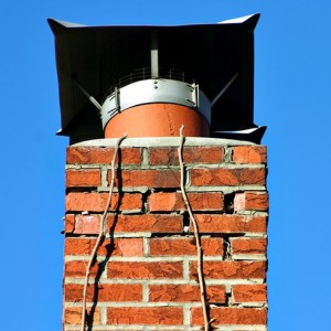Chimney with bad mortar joints in need of tuckpointing or repointing.