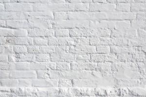 A white painted brick wall.