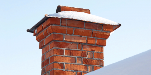 Signs You Need To Repair Or Replace Your Chimney Crown