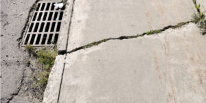 How to Know When to Fix Cracked Sidewalks + Repair Suggestions