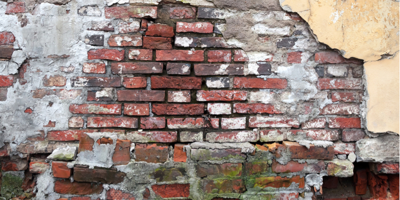 What Can Cause Water Damage Behind Brick Wall?